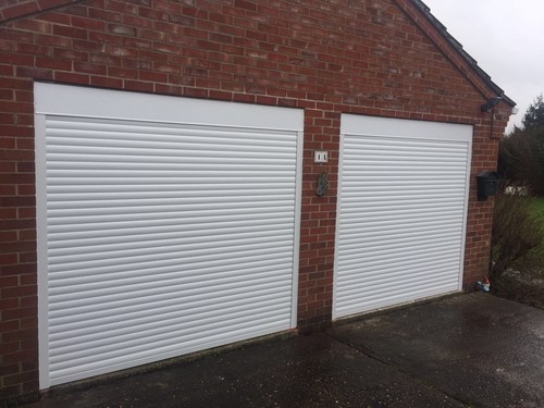 Electric roller garage door - roller,